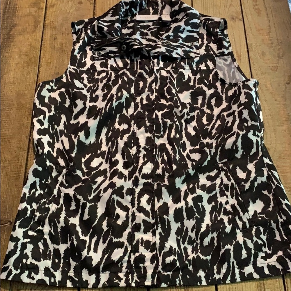 EUC vest from Chico’s black and ivory animal print lightweight fabric